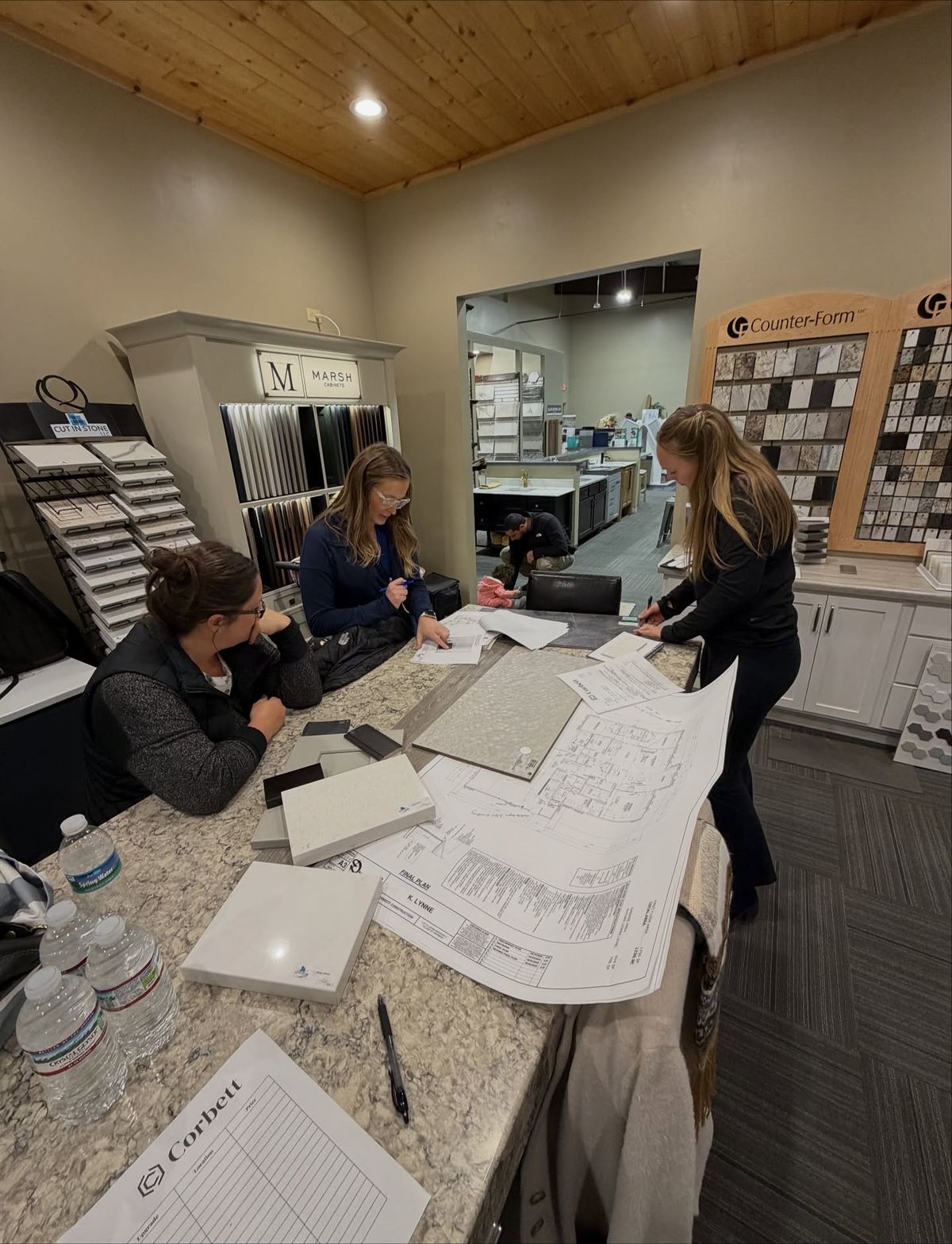 Remodeling design team discussing a project